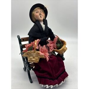 Byers Choice 2000 Woman on Bench with Baskets of Pointsettias